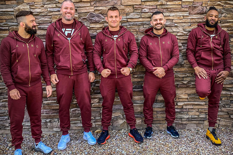 Ian Heinisch and team in the Tennyson Gold tracksuit