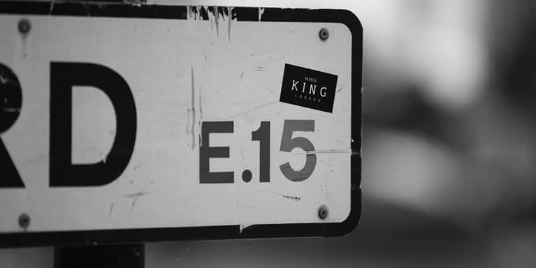 London E15 street sign with KING sticker