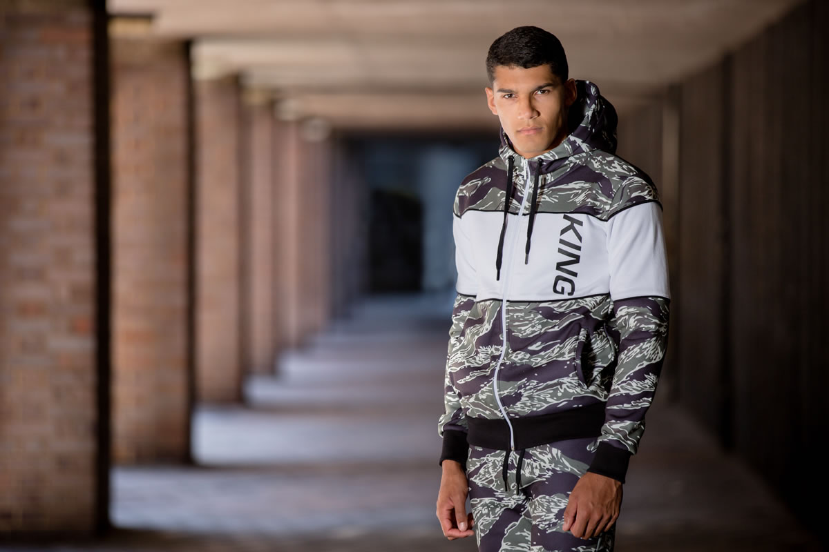 Model wearing tiger camo SS19 King Apparel Manor tracksuit