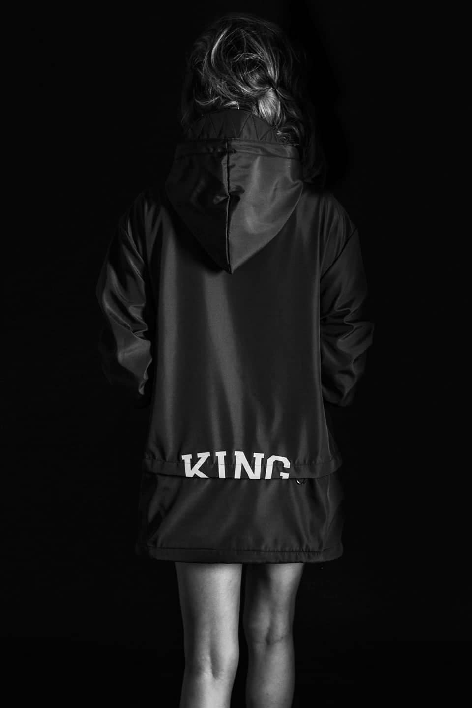 Model wears rain jacket from King Apparel Autumn / Winter 2014 collection