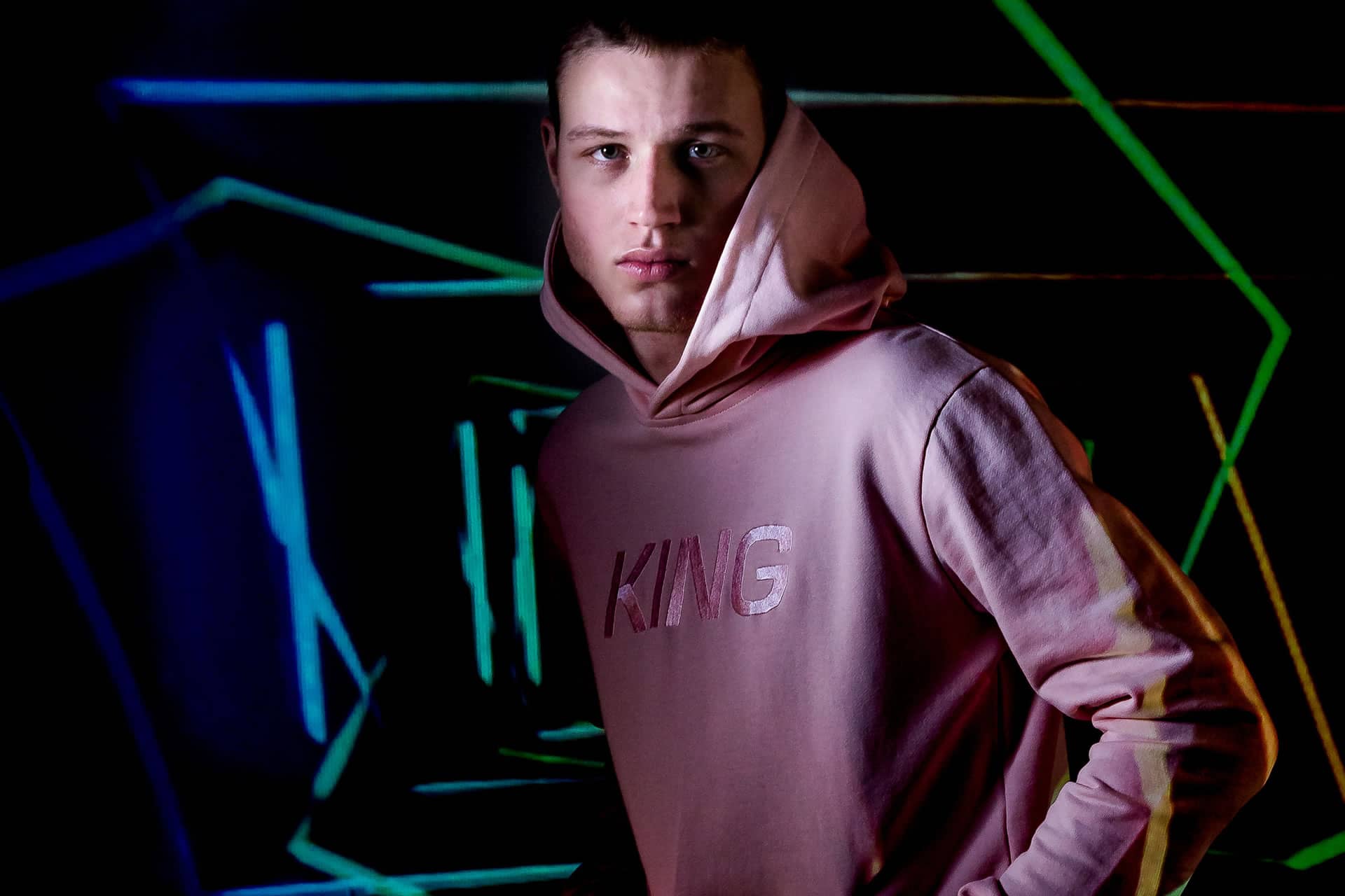 Model wears hoodie from King Apparel Autumn / Winter 2018 collection
