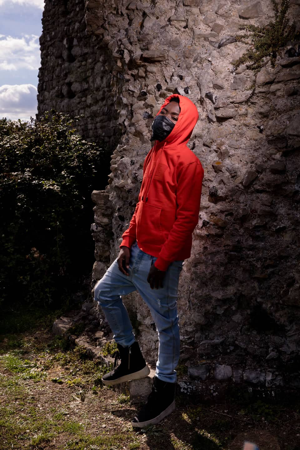 Fire Chulo wears hoodie and jeans from King Apparel Autumn / Winter 2018 collection
