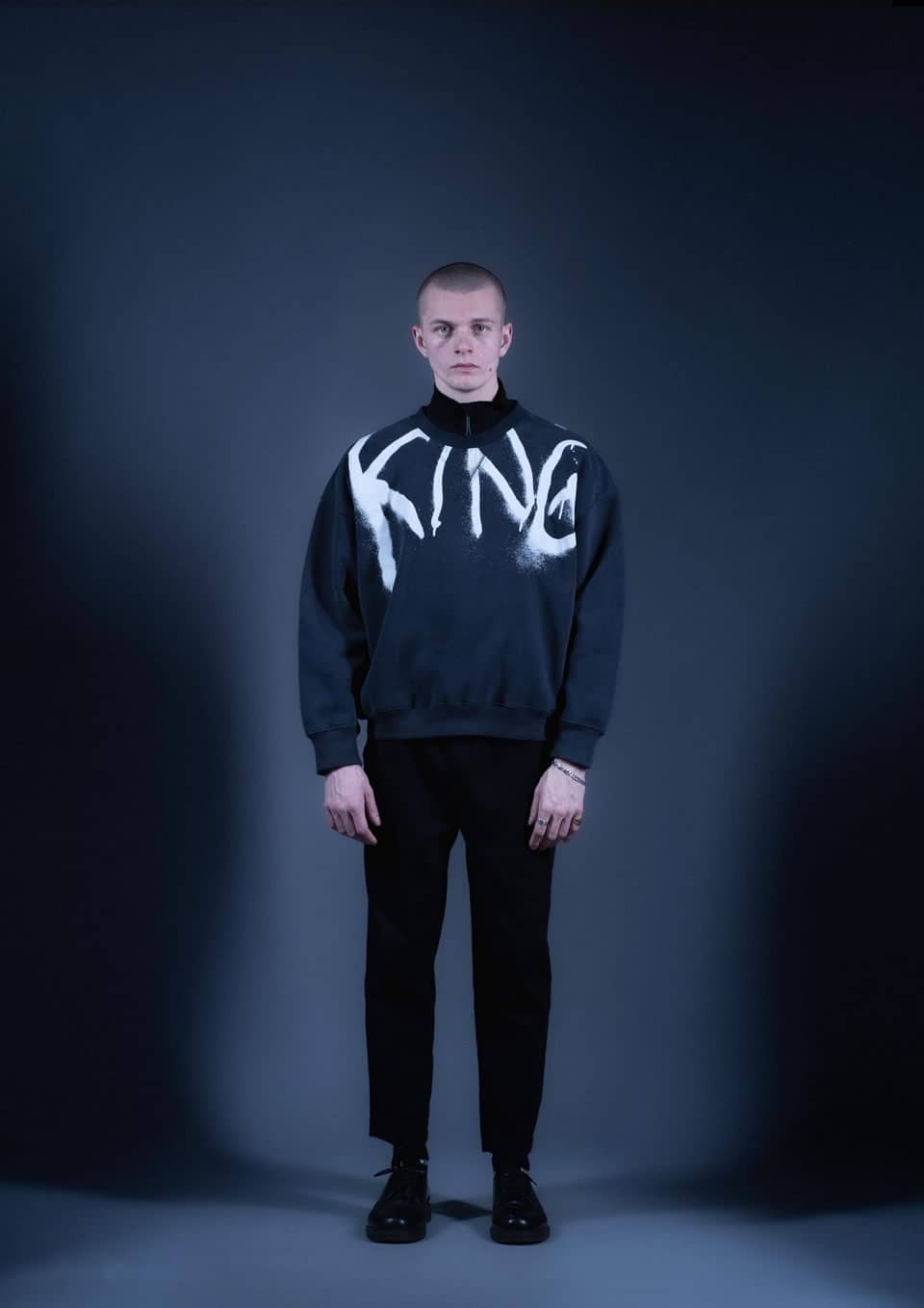 Model wears KING Apparel Silver Lining collection