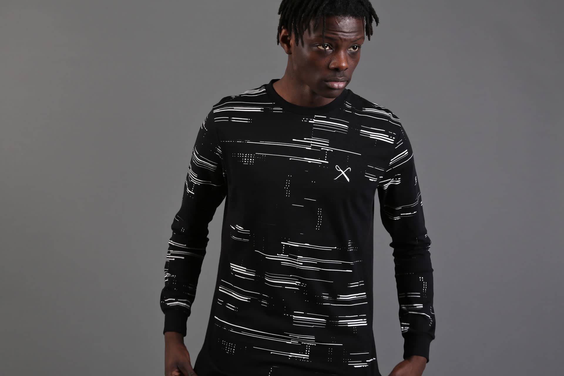 Model wears long sleeve t-shirt from King Apparel Spring / Summer 2016 collection