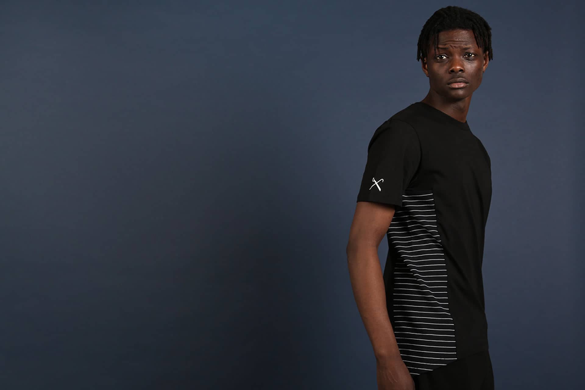 Model wears t-shirt from King Apparel Spring / Summer 2016 collection