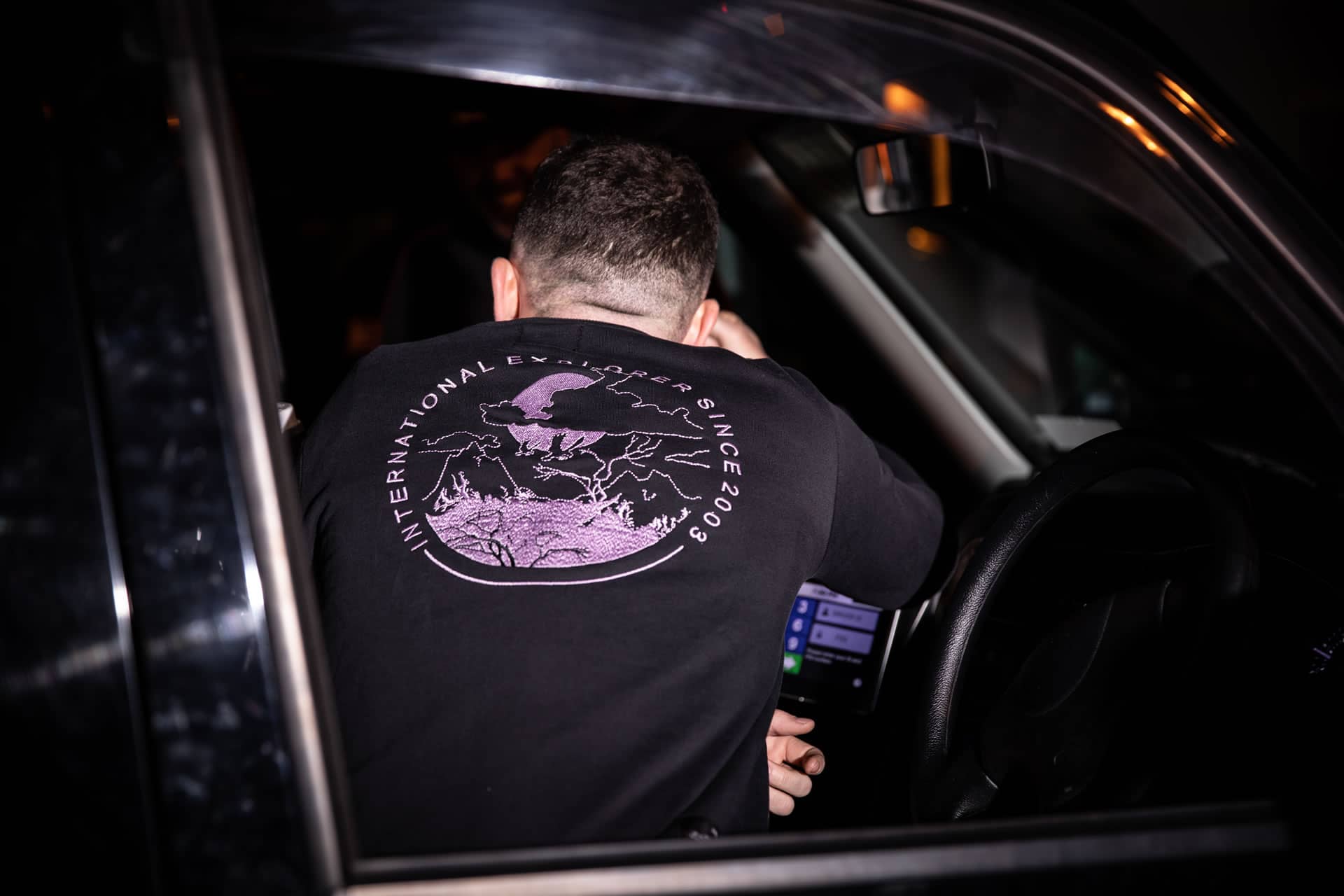 Cabbie wears King Apparel Explorer sweatshirt in black